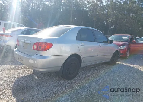 2005 Toyota Corolla Le z USA, uszkodzony, nr VIN 2T1BR32E95C558211